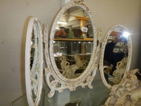 An ormolu style tripal oval framed dressing table mirror. COLLECT ONLY.
