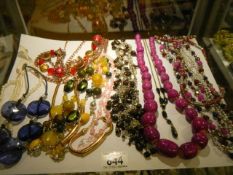 A quantity of beads and necklaces.