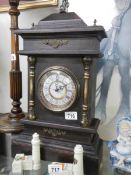 An Edwardian style mantel clock.