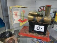 A boxed Mamod model power press and a stationary steam engine.