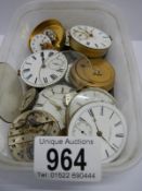A quantity of old pocket watch movements for spare or repair.