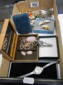 A mixed lot of costume jewellery including art deco cocktail watches, butterfly brooches etc.,