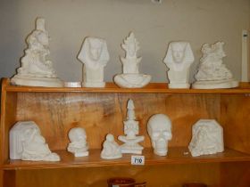 A good selection of plaster ornaments including Egyptian, Indian, skulls, cherub wall brackets etc.,