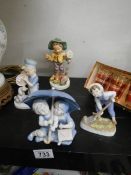 A Royal Worcester days of the week 'Saturday Boy' and three others.