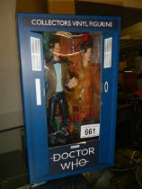 A boxed Doctor Who figure of the 11th Doctor (Matt Smith) with interchangable head with fez.