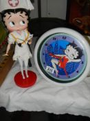 A Betty Boop nurse figure on a base approx. 35cm, (1 finger a/f) and a Betty Boop wall clock.
