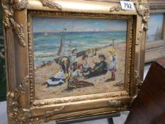 An ornate gilt framed study of an Edwardian family at the seaside, 36 x 32 cm, COLLECT ONLY.