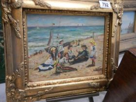 An ornate gilt framed study of an Edwardian family at the seaside, 36 x 32 cm, COLLECT ONLY.