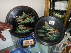 A pair of vintage oriental lacquered trays and a trinket box.