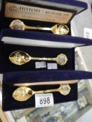 Three cased 'History of the Monarchy' spoons.