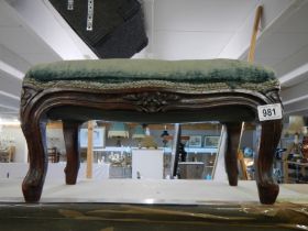 A 19th century mahogany cabriole leg foot stool.