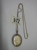 A silver locket on a silver chain.