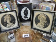 Three vintage framed and glazed silhouettes.