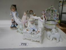 A mixed lot of continental bisque porcelain figures etc.,