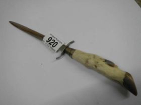 A vintage taxidermy hoof handled letter opener.