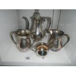 A four piece silver plate tea set.