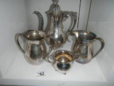A four piece silver plate tea set.