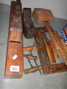 A quantity of vintage carpenter's tools including planes, measures, cork screws etc.,
