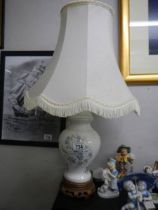 A ginger jar style table lamp.