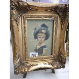 An ornate gilt framed study of a child, frame 25 x 30 cm, image 11.5 x 17cm. COLLECT ONLY.