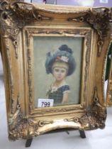 An ornate gilt framed study of a child, frame 25 x 30 cm, image 11.5 x 17cm. COLLECT ONLY.