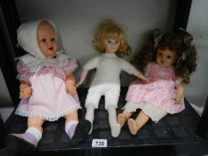 Three vintage dolls.