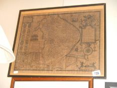 A framed antique map of Lincolnshire. COLLECT ONLY.