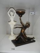 An art deco style figurine and one other.