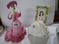 A Royal Doulton Blossom Time figurine and a Coalport Victoria Rose figurine