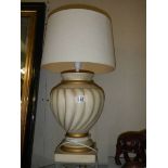 An urn shaped table lamp.