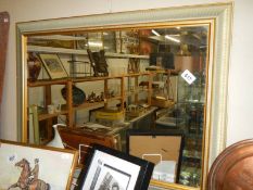 A gilt framed bevel edged mirror, 84 x 62 cm. COLLECT ONLY.