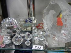 A mixed lot of glass paperweights and ornaments.