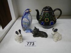A miniature Cloissonne' teapot (missing lid knob), a Cloissonne' penguin and three metal dogs.