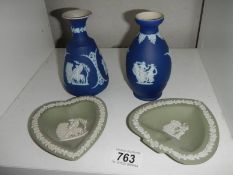 Four pieces of Wedgwood Jasper ware.