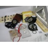 A quantity of compass/temporature gauges etc.,