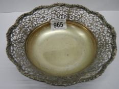 An old white metal bowl with fretted rim (not marked put possibly silver).