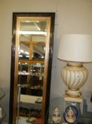 A large bevel edged mirror, 45 x 136 cm. COLLECT ONLY.