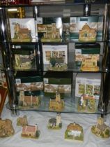 Fifteen boxed Lilliput Lane cottages.