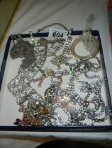 A good lot of vintage necklaces and earrings.