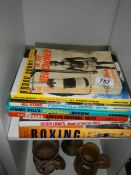 A quantity of old books relating to football and boxing.