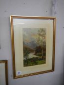 A gilt framed and glazed mountain lake scene signed L Eccles?, 40 x 53 cm, COLLECT ONLY.