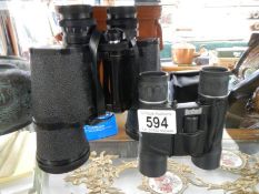 Two pairs of binoculars (Bushnell and Carl Veitch).