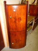 A mahogany bow fronted corner unit, COLLECT ONLY.