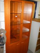 A teak glazed top corner cabinet, COLLECT ONLY.