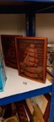 A pair of wooden carved sailing ship design bookends