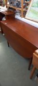 A dark teak drop leaf dining table COLLECT ONLY