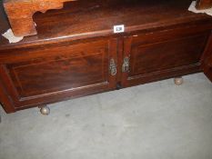 An oak two door cabinet, COLLECT ONLY.