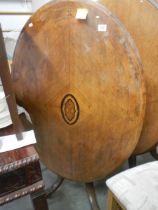 A Victorian mahogany inlaid tip top table on bird cage base, COLLECT ONLY.