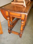 An oak drop leaf table, COLLECT ONLY.