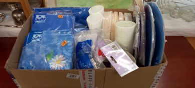 A quantity of new disposable plates, napkins, spoons, cups etc